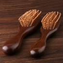 Wooden massage comb