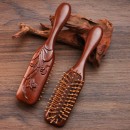 Wooden massage comb