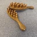 Wooden massage comb