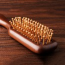 Wooden massage comb