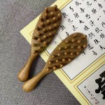 Wooden massage comb