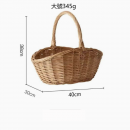 Hand woven hand-held basket