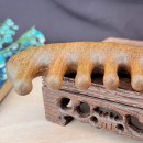 Wooden massage comb