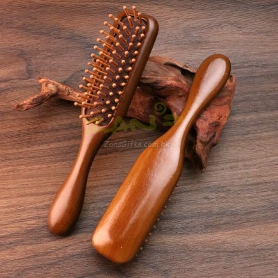 Wooden massage comb