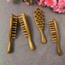 Wooden massage comb