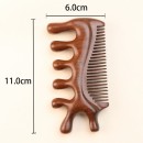 Wooden massage comb