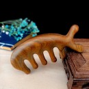 Wooden massage comb