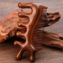 Wooden massage comb