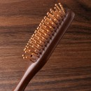 Wooden massage comb