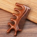 Wooden massage comb